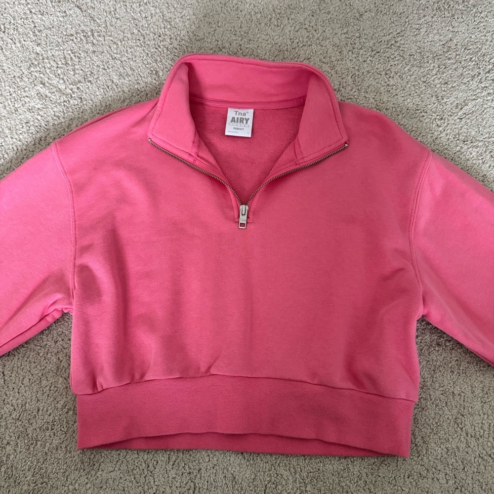 Cropped quarter zip pink top